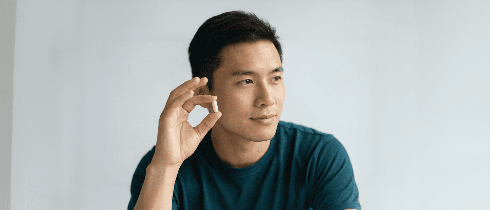 Man holding Arka capsule